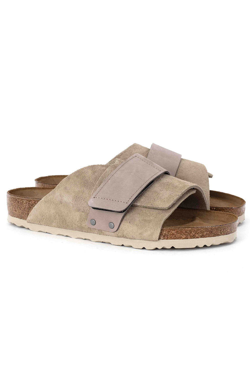 Birkenstock Kyoto Sandals Taupe BR1015572 for women walking on the beach