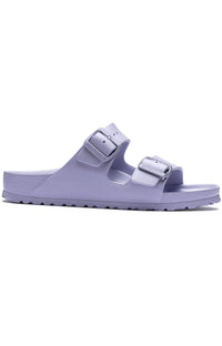 Thumbnail for Person wearing Arizona Eva Sandals Purple Fog while walking on a rocky trail