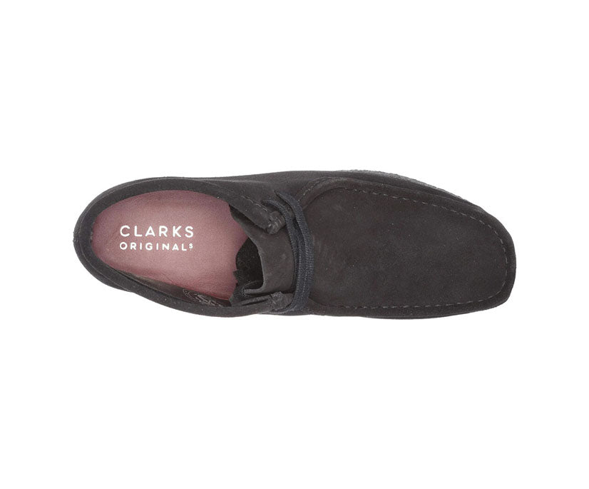 Fashionable and versatile Clarks women's boots in classic black suede