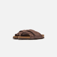 Thumbnail for Alt text: Birkenstock Kyoto Nubuck Roast, a comfortable and stylish sandal made with high-quality nubuck leather in a rich roast color