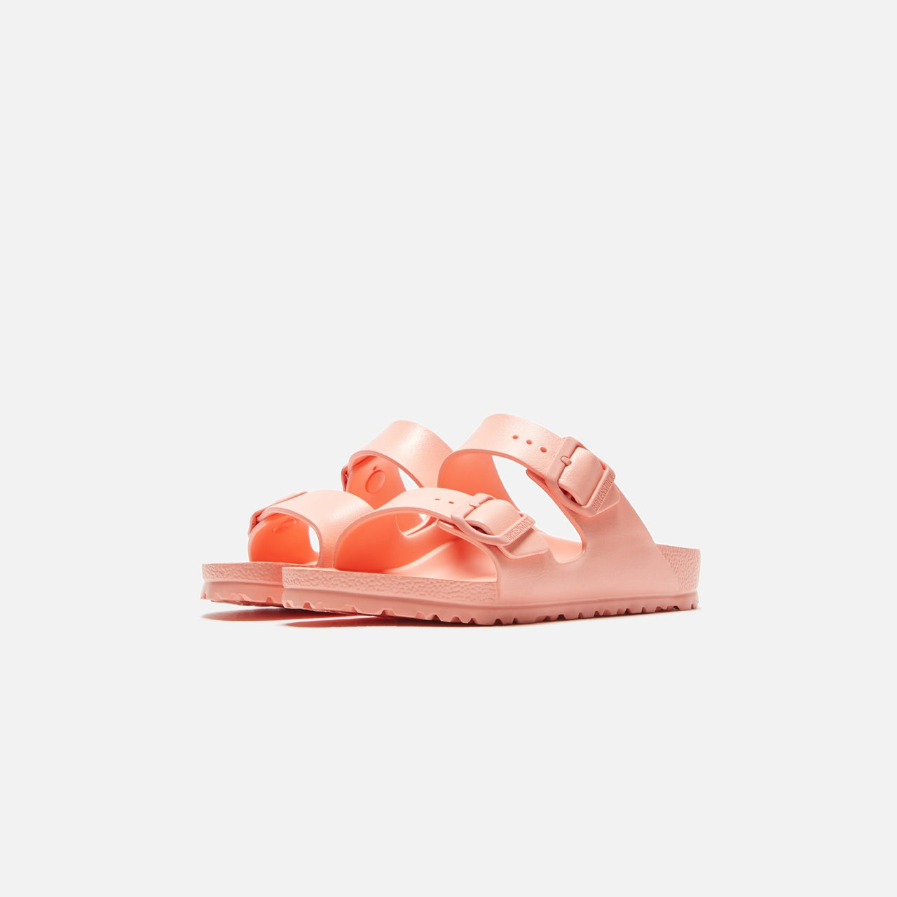 Comfortable and stylish coral peach Birkenstock Women's Arizona Eva sandals