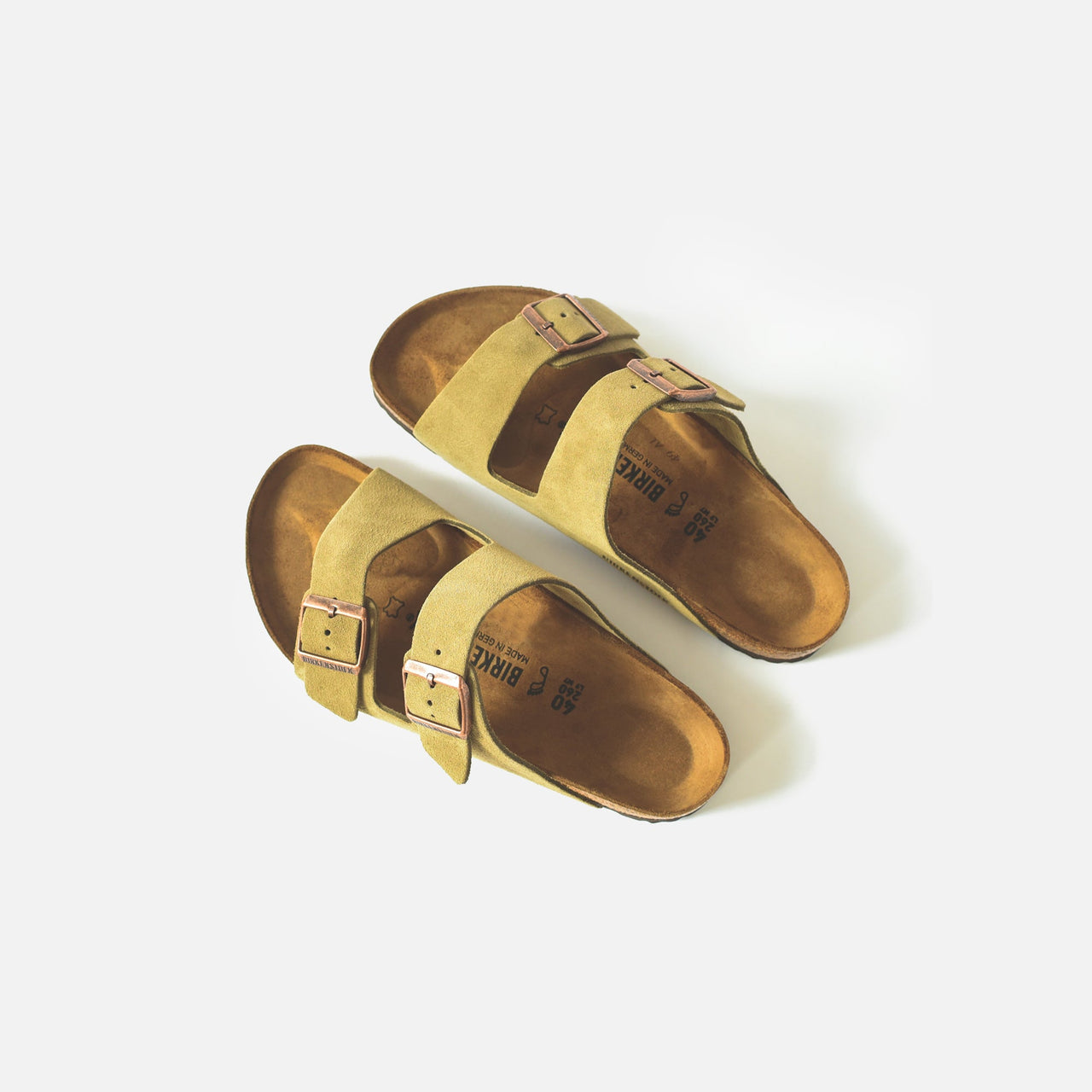 Women's Arizona Suede Taupe Birkenstock sandals featuring comfortable two-strap design