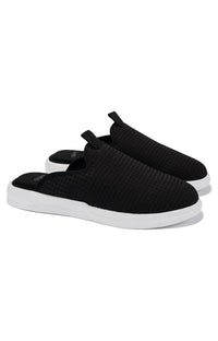 Thumbnail for Pelli Waffle Slippers in Jet Black with a Lily White trim, perfect for cozy nights at home 