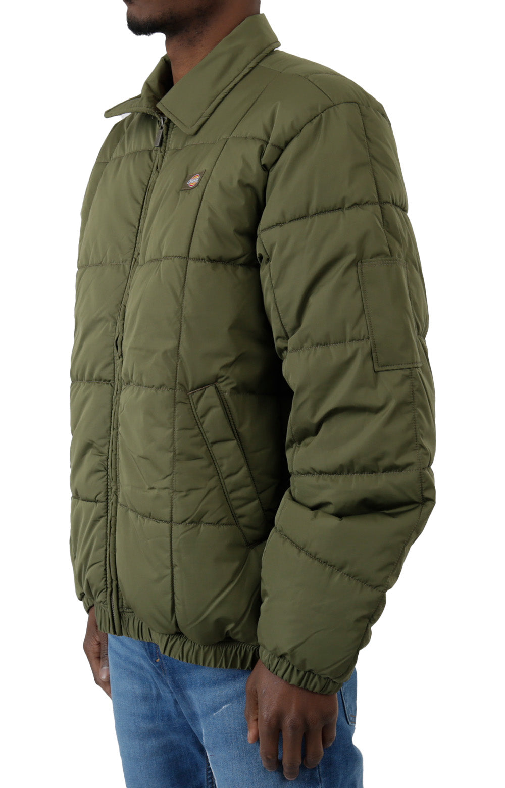 Stylish and durable puffer jacket in military green with zip closure