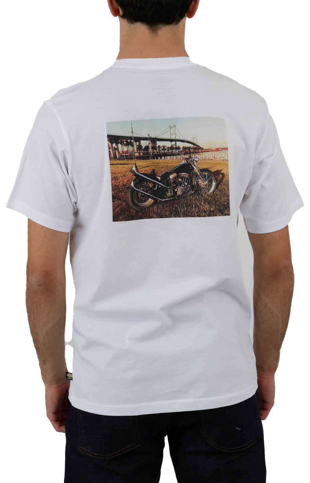 A white t-shirt featuring a photo of Ronnie Sandoval for purchase