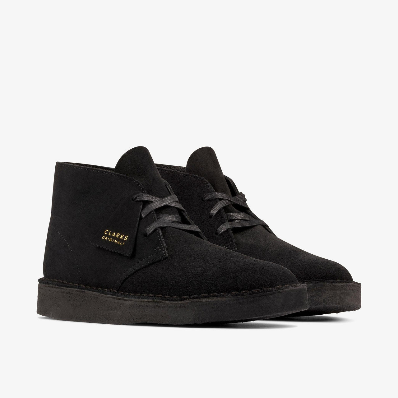 Close-up of black suede men's Clarks Desert Coal shoes, featuring a classic design and comfortable fit