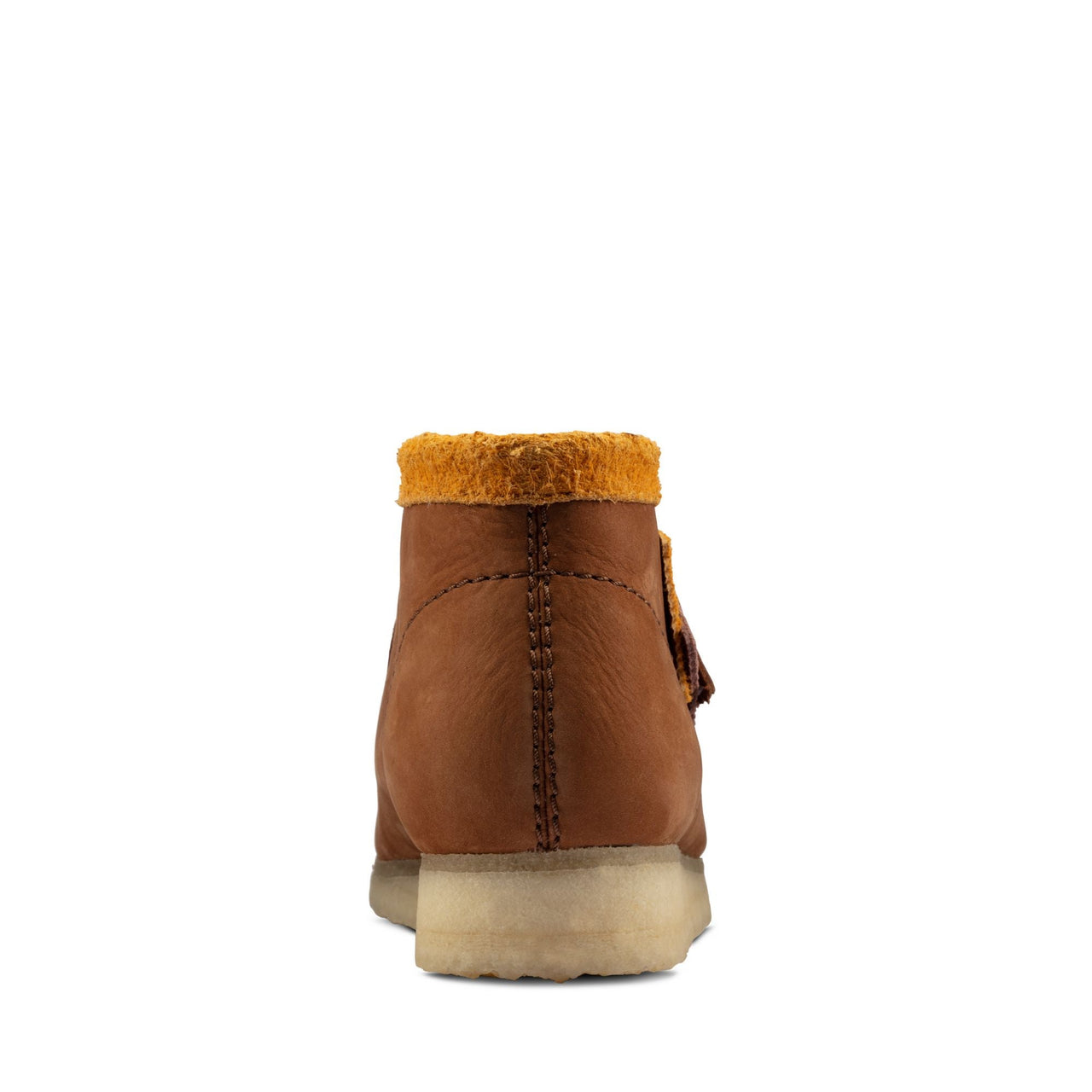 A pair of men's Clarks Wallabee boots in brown suede material