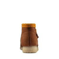 Thumbnail for A pair of men's Clarks Wallabee boots in brown suede material