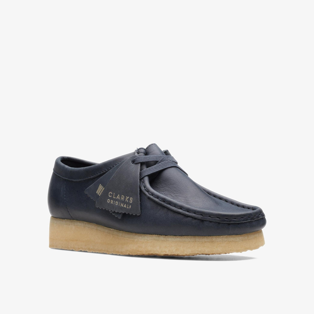 Side view of Womens Clarks Wallabee in Navy Leather, showcasing the iconic silhouette