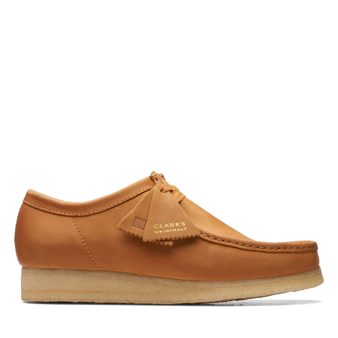 A close-up image of the iconic [26168842] MENS CLARKS WALLABEE shoe in tan suede, showcasing its classic moccasin construction and crepe sole