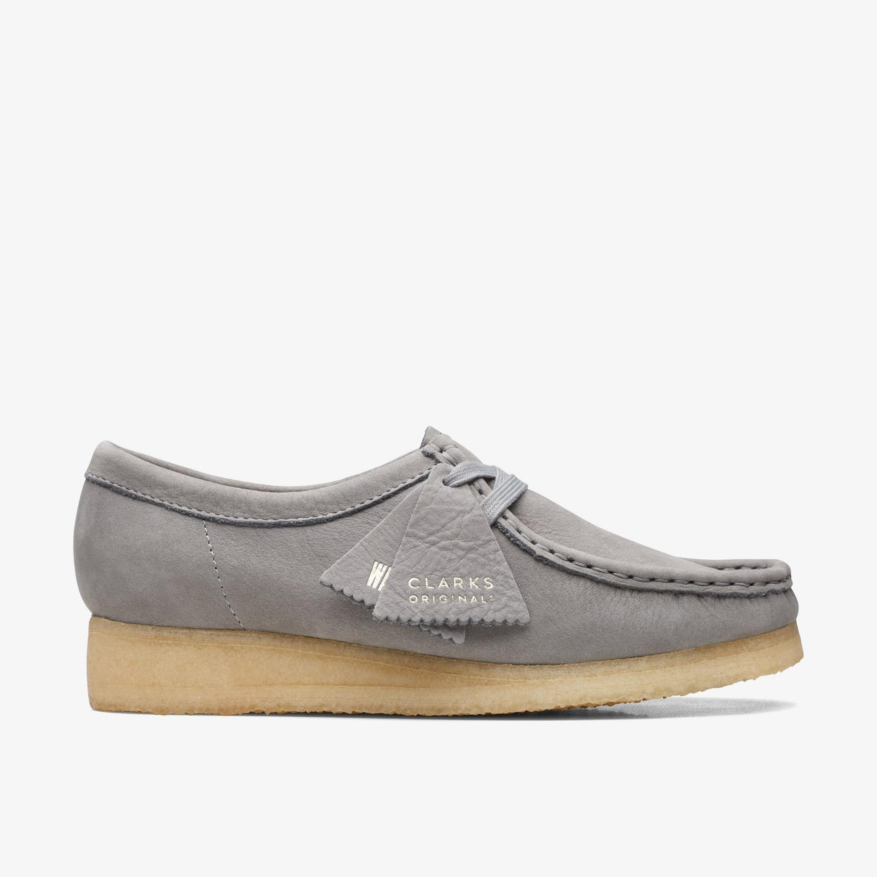 A close-up image of the Womens Clarks Wallabee shoes in grey nubuck material, showcasing the iconic moccasin construction and comfortable crepe sole