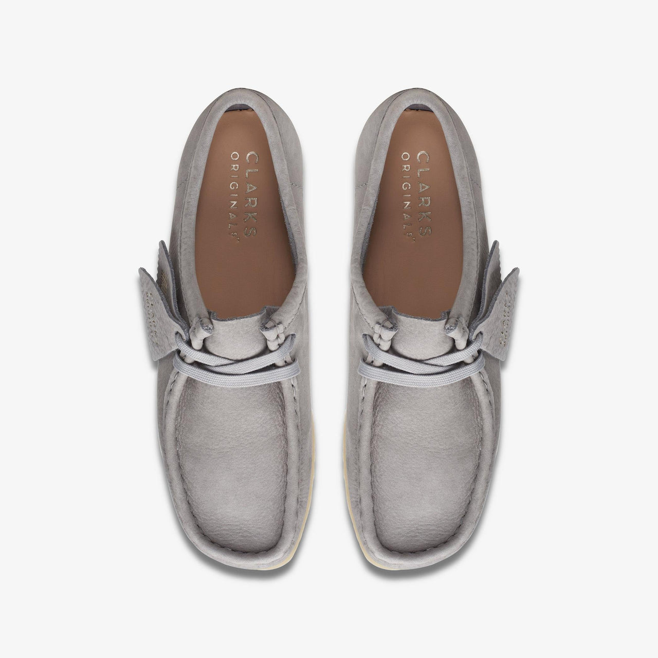 Close-up of women's Clarks Wallabee shoes in grey nubuck material