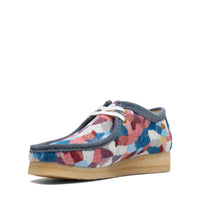 Thumbnail for Side view of womens Clarks Wallabee shoes with crepe sole