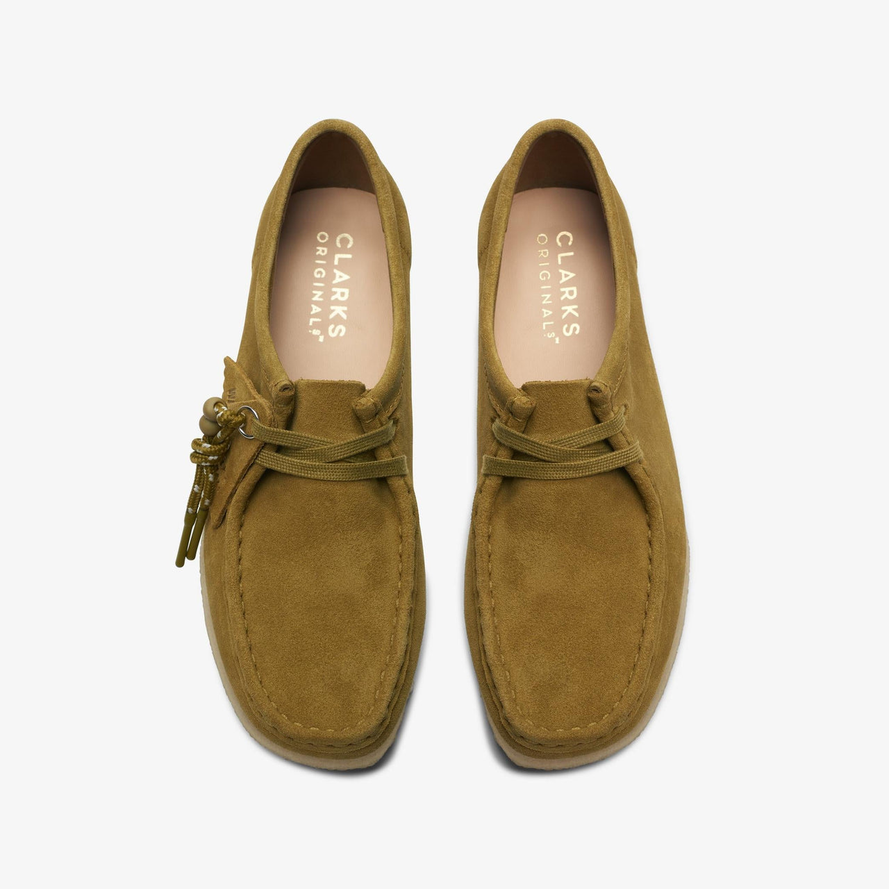 High-quality womens Clarks Wallabee in mid green suede, front view