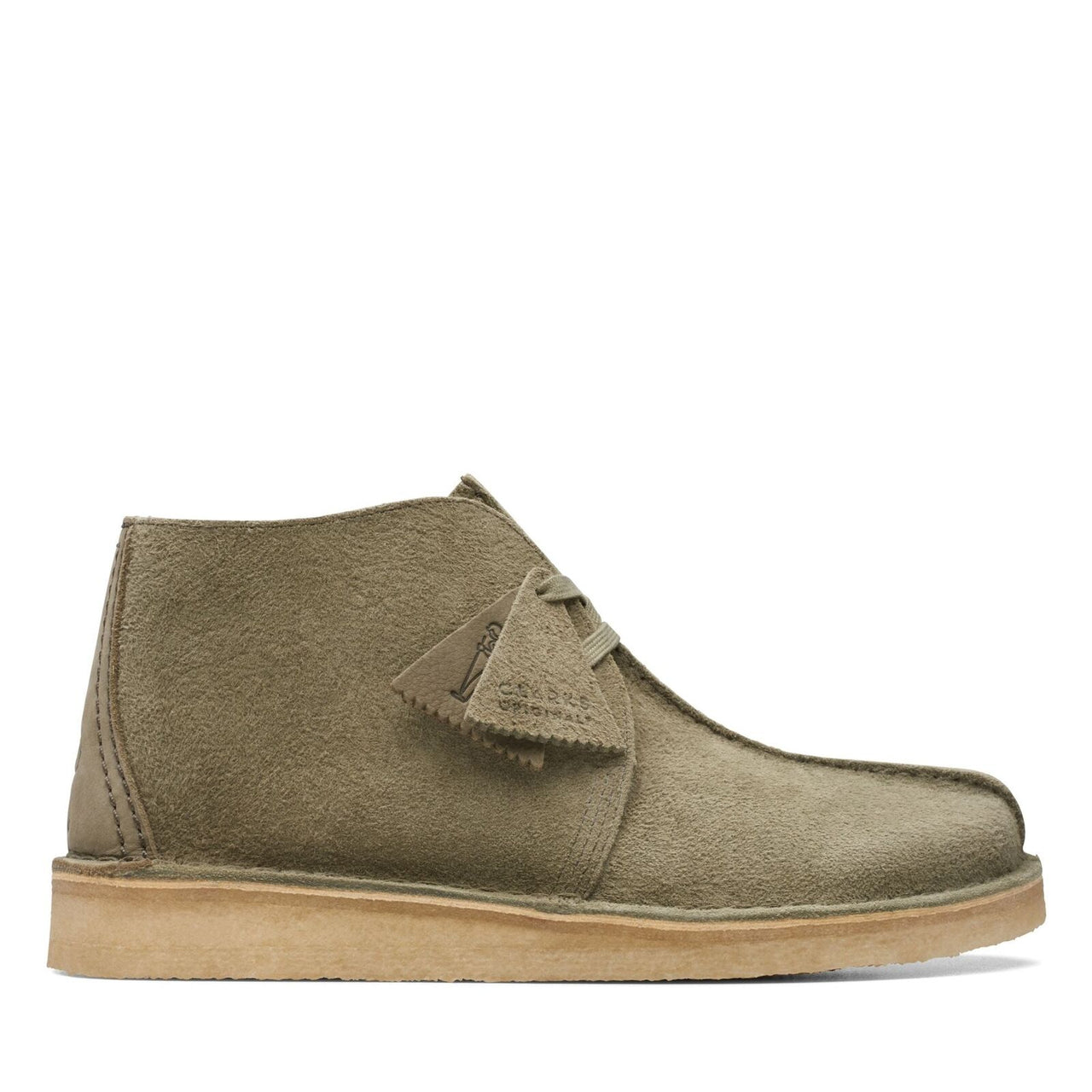 Clarks Originals Desert Trek Hi 50 Men's Forest Green Suede 26173615 shoes standing on a rocky trail with a forest in the background