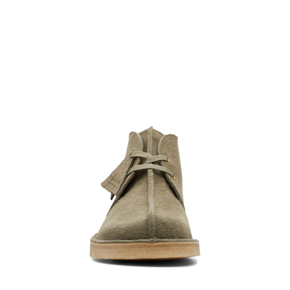  Clarks Originals Desert Trek Hi 50 Men's Forest Green Suede 26173615 shoes featured in a lifestyle setting, paired with casual clothing