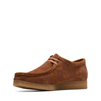 Thumbnail for Close-up of the iconic Clarks Wallabee shoes for men in brown suede