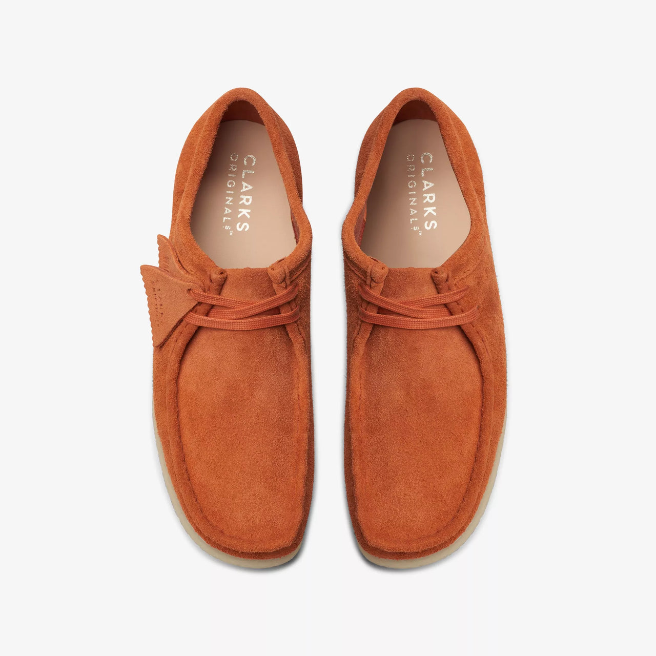 Premium mens Clarks Wallabee Burnt Orange shoes in a unique color