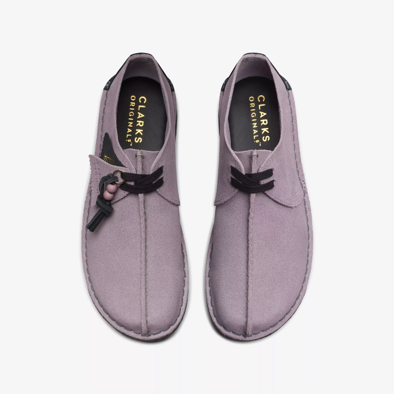 Womens CLARKS DESERT TREK - MAUVE boots styled with rolled-up jeans and a sweater