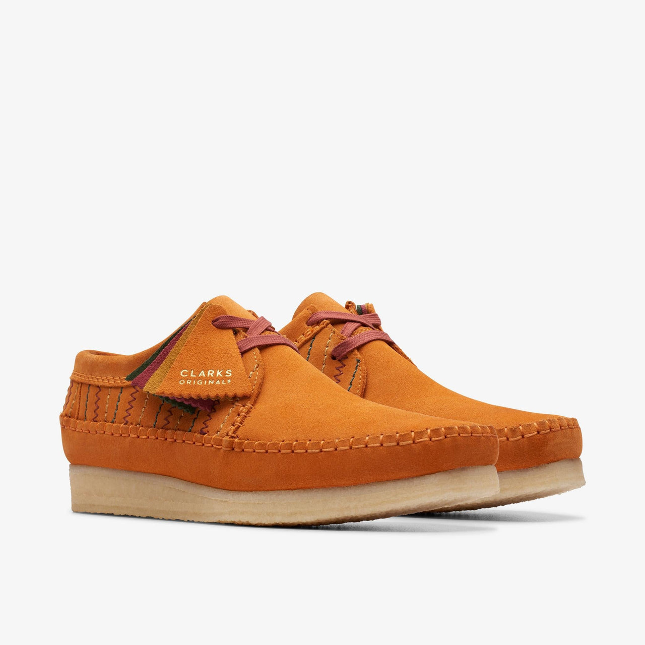 Close-up image of the Mens CLARKS WEAVER shoes in burnt orange and brown combination, showcasing the intricate weave pattern and high-quality leather material