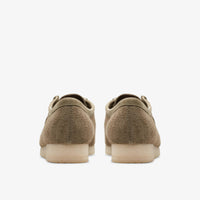 Thumbnail for  Mens Clarks Wallabee in Pale Khaki Suede, styled with rolled up jeans 