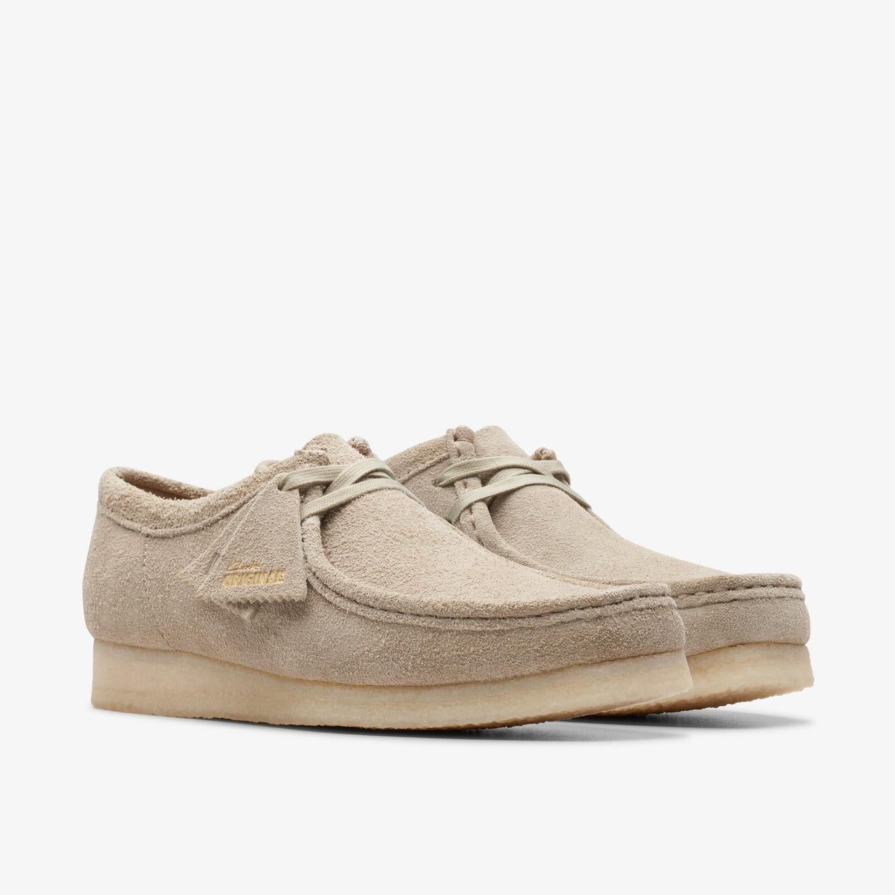 Side view of mens' Clarks Wallabee shoes in pale grey