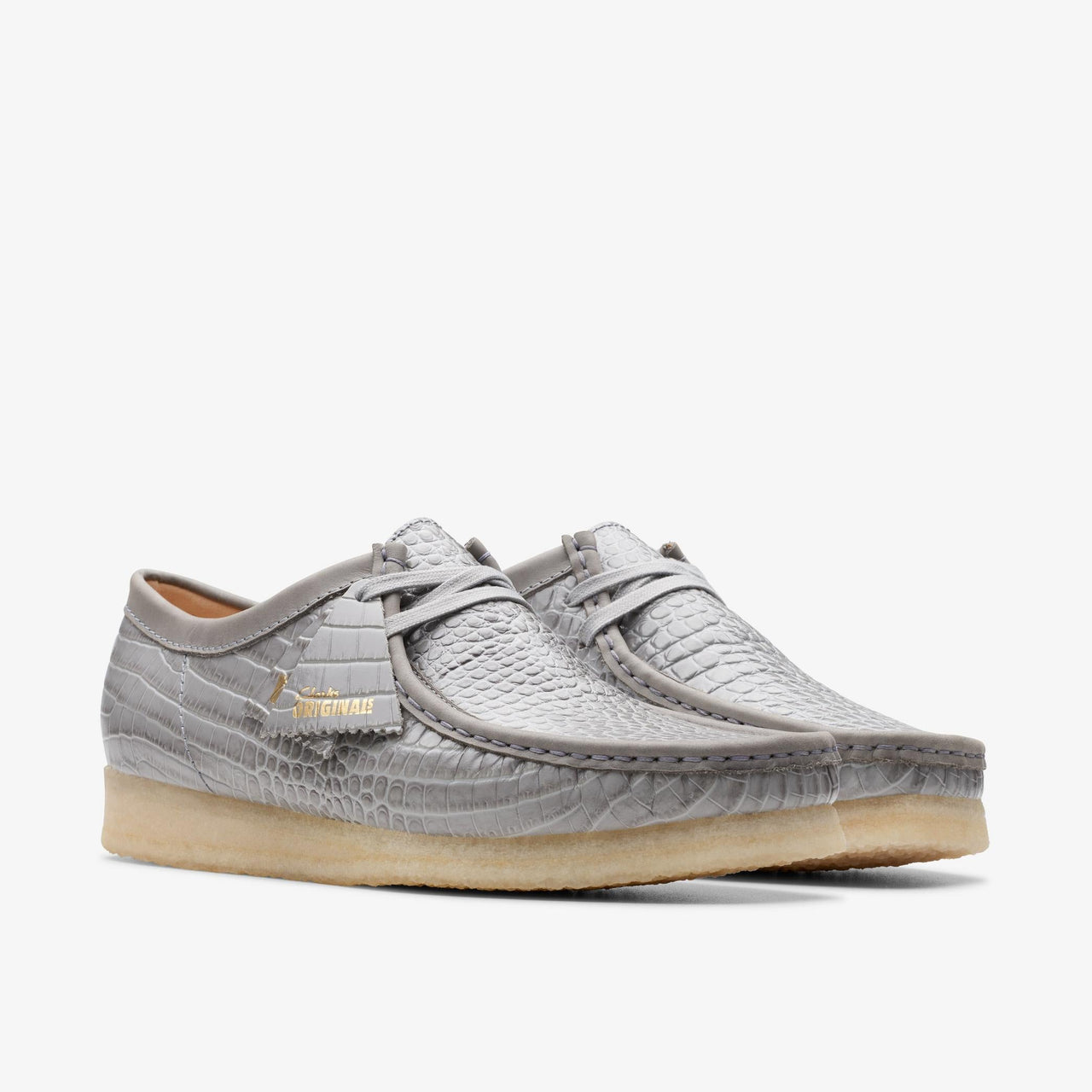 Fashionable mens Clarks Wallabee in a cool grey crocodile print