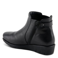 Thumbnail for Black leather Spring Step Apso boots with cozy faux-fur lining and rugged rubber soles