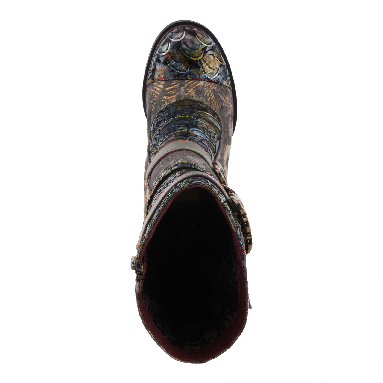 A pair of handcrafted leather Averie boots by L'Artiste, featuring intricate floral and geometric embossed designs, a stacked heel, and a comfortable cushioned footbed