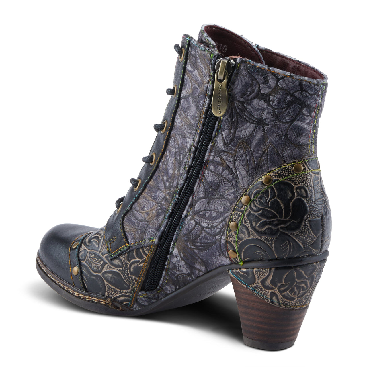 Handcrafted leather Avyanna boots with intricate floral details and vintage-inspired design