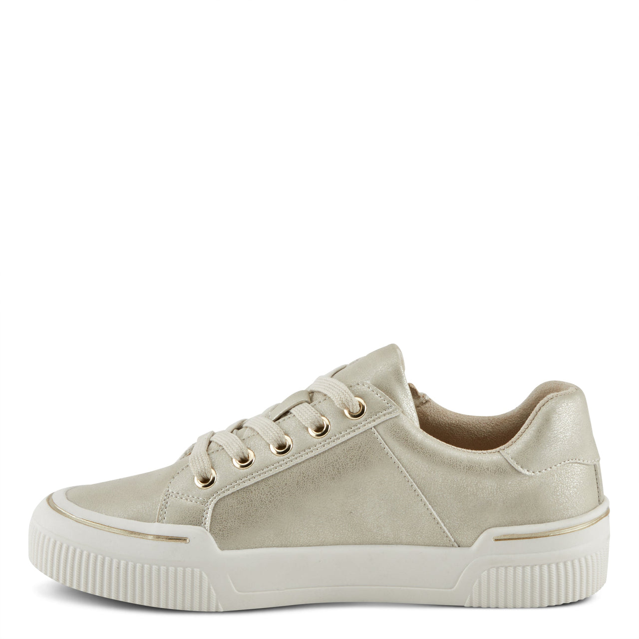 Stylish and comfortable Patrizia Darah sneakers with white and gold accents on a person's feet walking in an urban setting