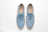 Thumbnail for Close-up of the Johnny Famous Bally Style Midtown Men's Baby Blue Suede Low Tops logo on the back heel
