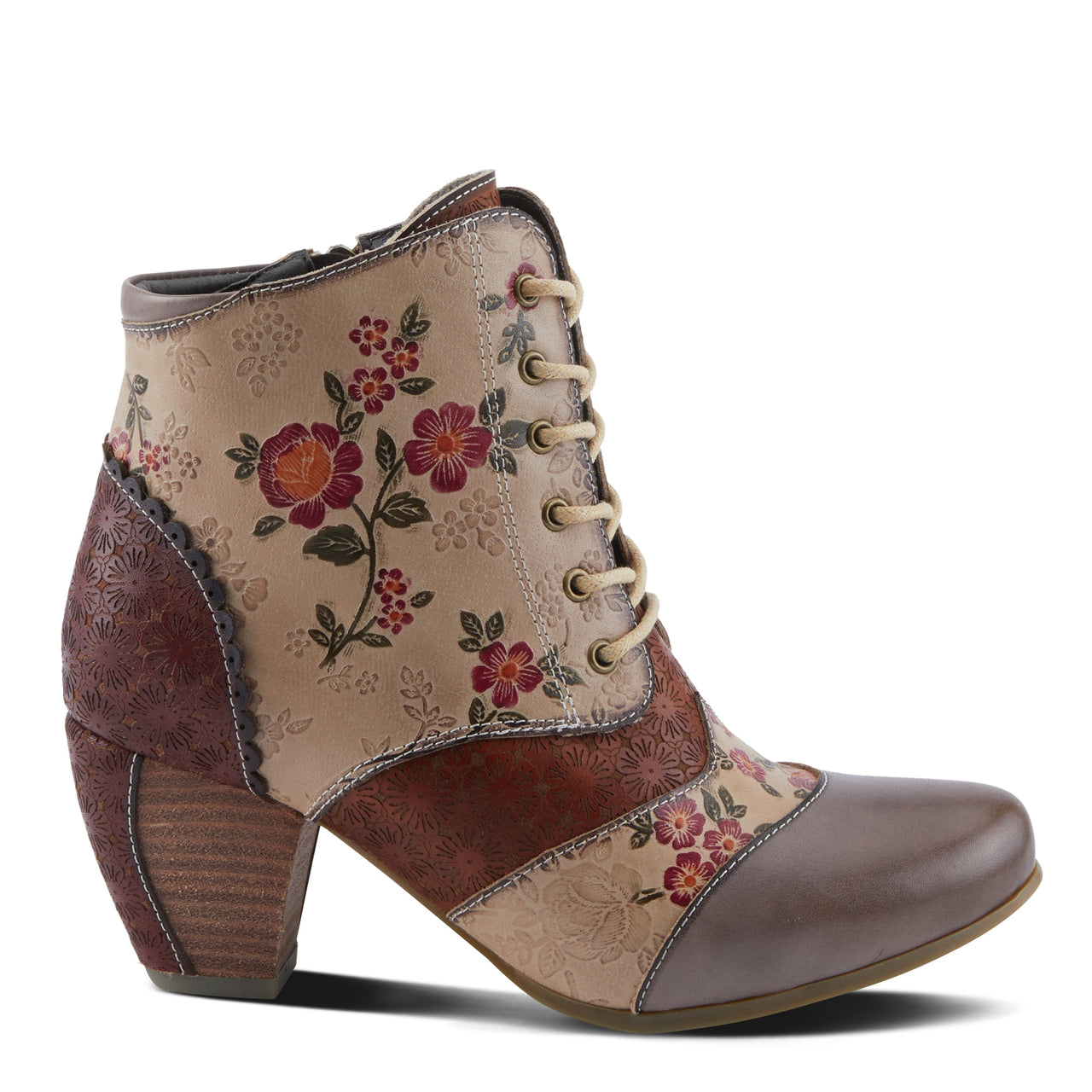 A close-up image of the L'ARTISTE HIADELVICE BOOTS, featuring a rich brown leather upper, intricate floral embroidery, and a sturdy stacked heel