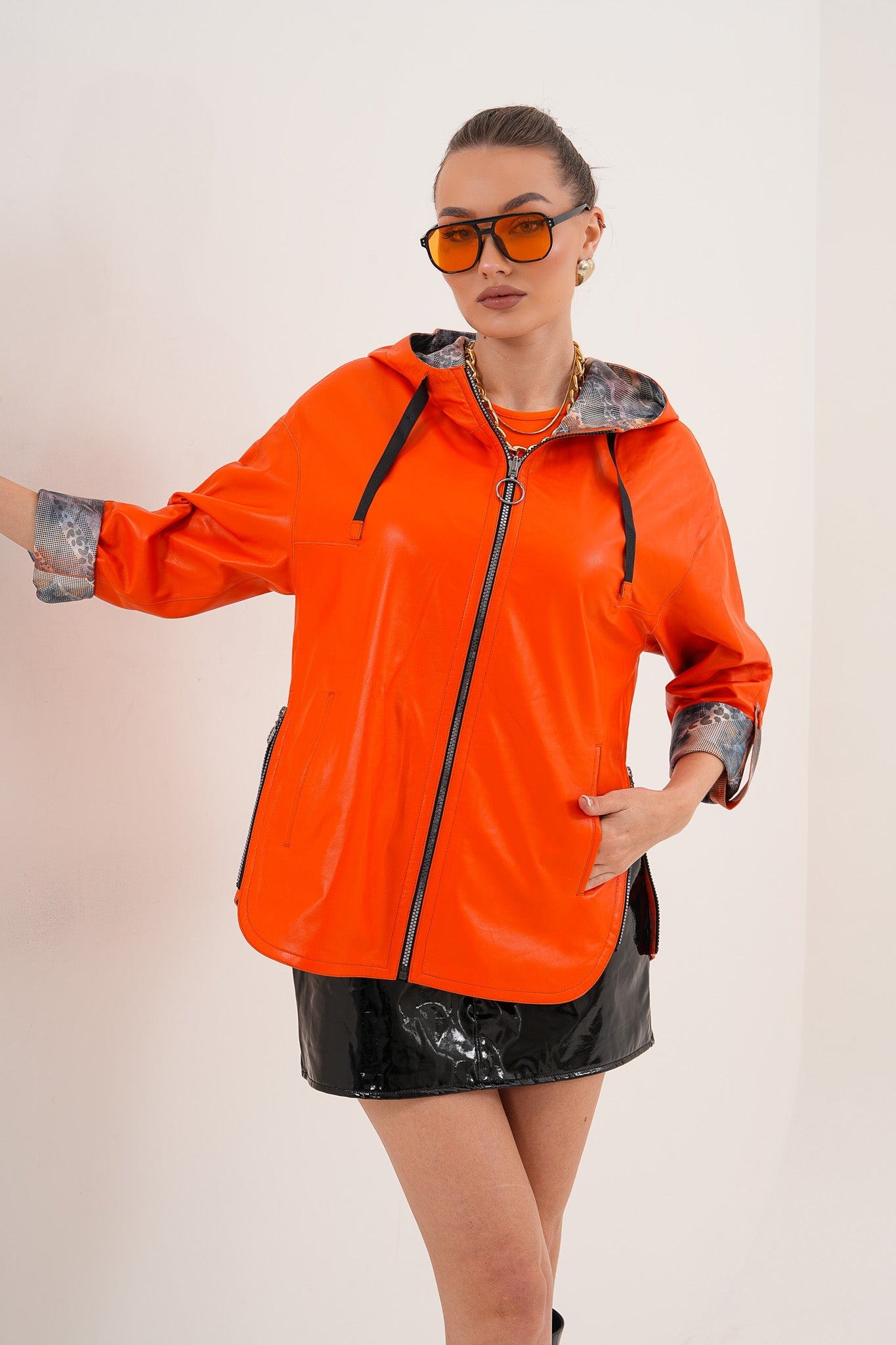The Nyxara Reversible Hooded Orange Leather Jacket