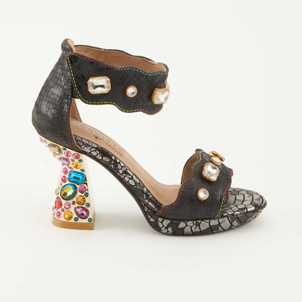 A pair of L'ARTISTE JEWELL closed back sandals in brown leather with floral accents and adjustable ankle strap