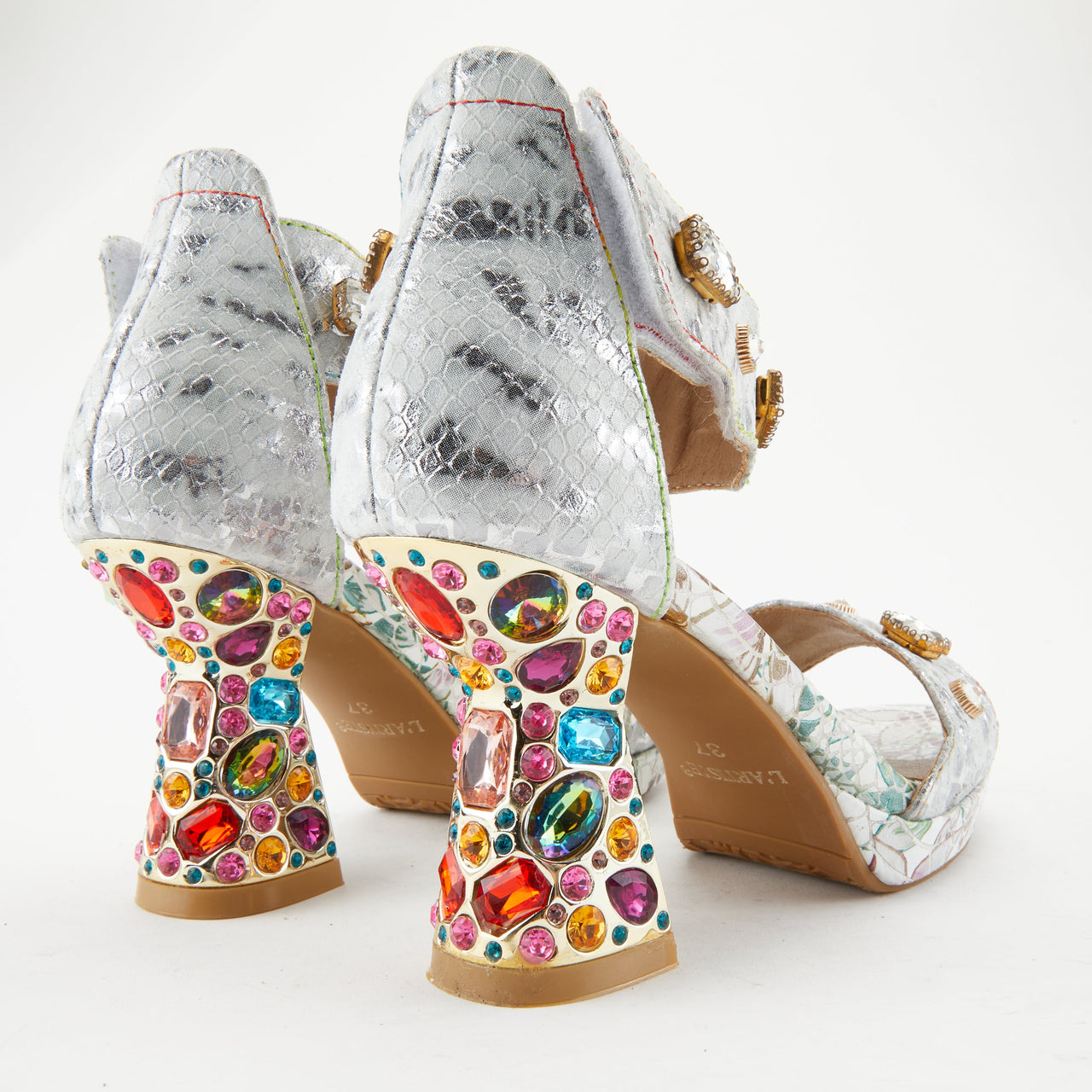 A pair of L'ARTISTE JEWELL CLOSED BACK SANDALS featuring intricate handcrafted details and comfortable closed-back design for stylish and chic summer footwear