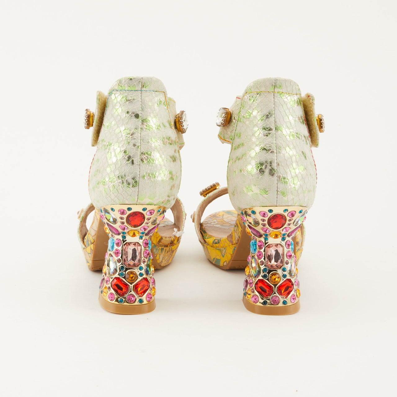 A close-up image of the L'ARTISTE JEWELL CLOSED BACK SANDALS, featuring hand-painted floral design and comfortable cushioned footbed