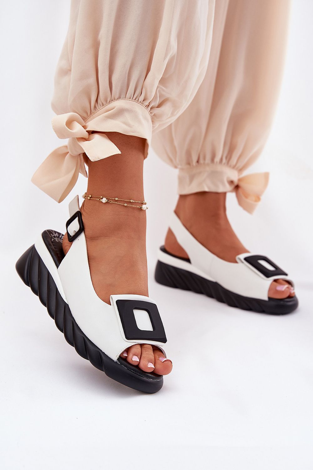 Avenlisse Buckled Accent Wedge Sandals