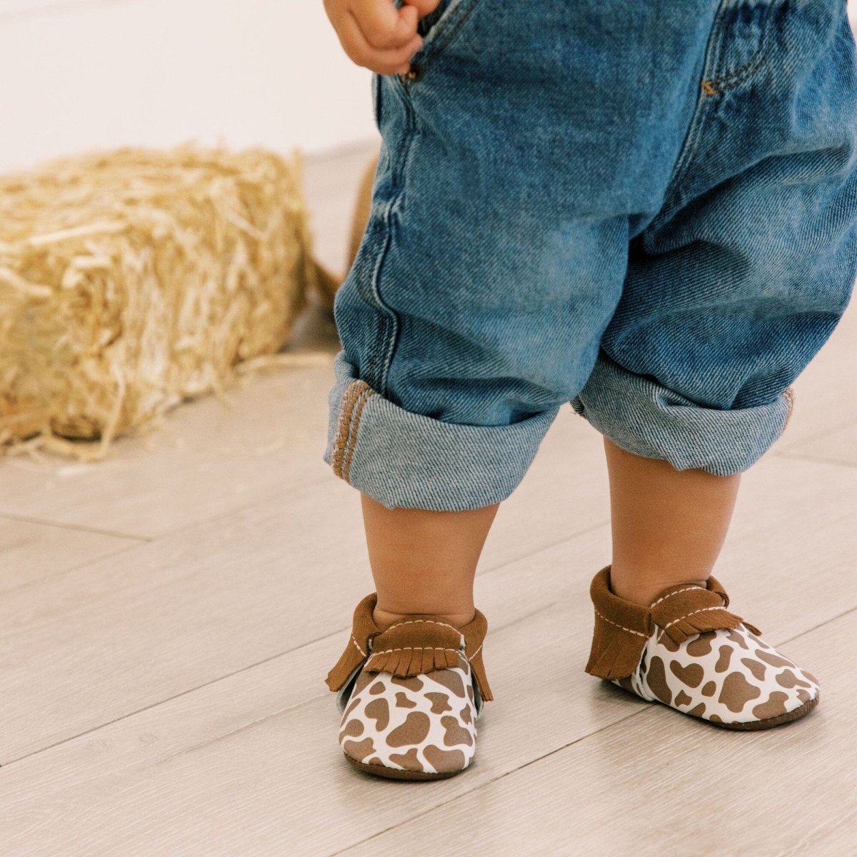 Suede Cow Print Moccasin Baby Shoe Moccasin by Freshly Picked – Don't Panic Shoes