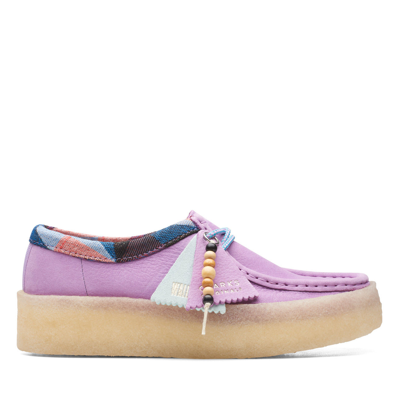 Pair of light purple Clarks Women Wallabee Cup Shoes on white background
