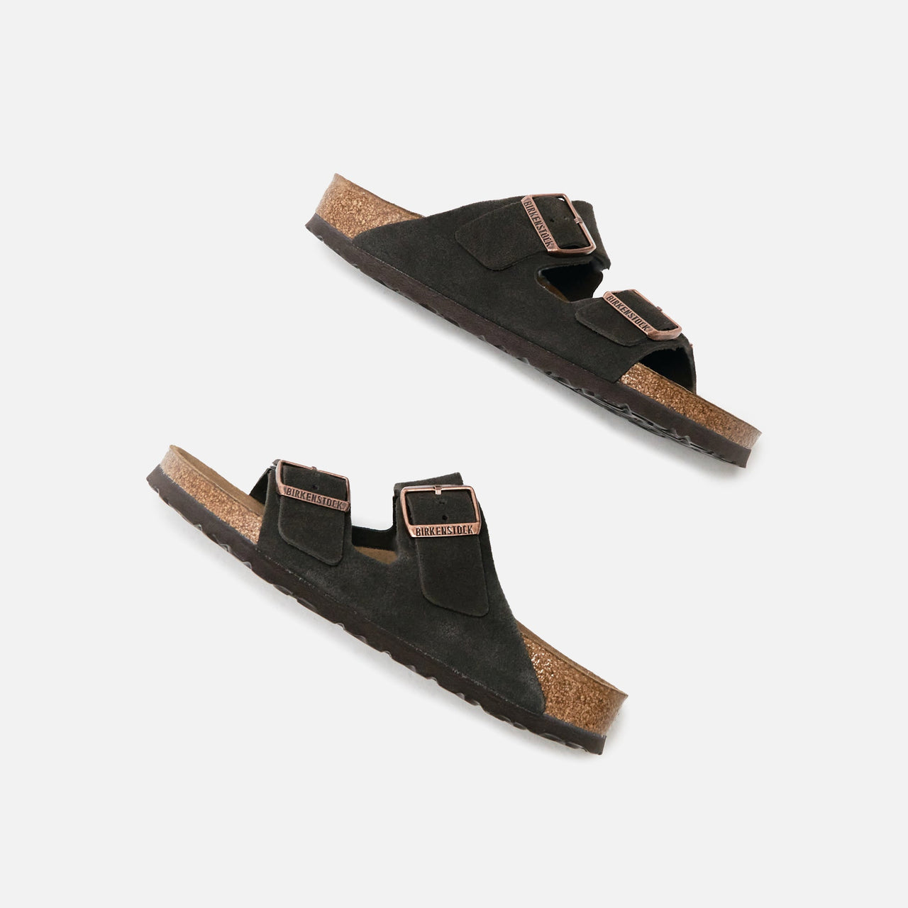 Pair of Mocha-colored Birkenstock Women's Suede Sandals featuring soft suede material, contoured footbed, and durable rubber sole