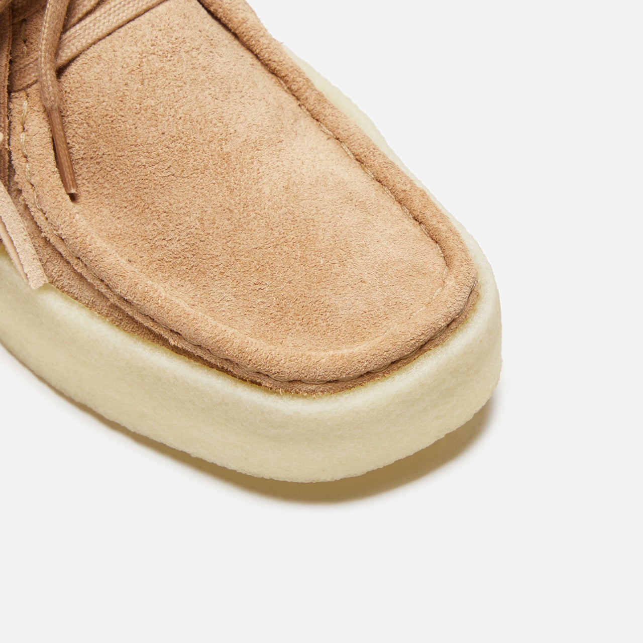 Side view of the Clarks Originals Wallabee Cup Women's Warm Beige Suede 261732524 shoes
