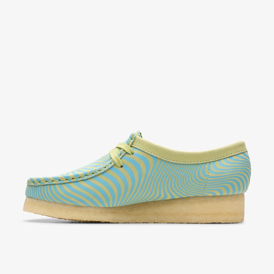  Pair of Clarks Women Wallabee Blue/Lime Print 26175834 shoes on wooden floor